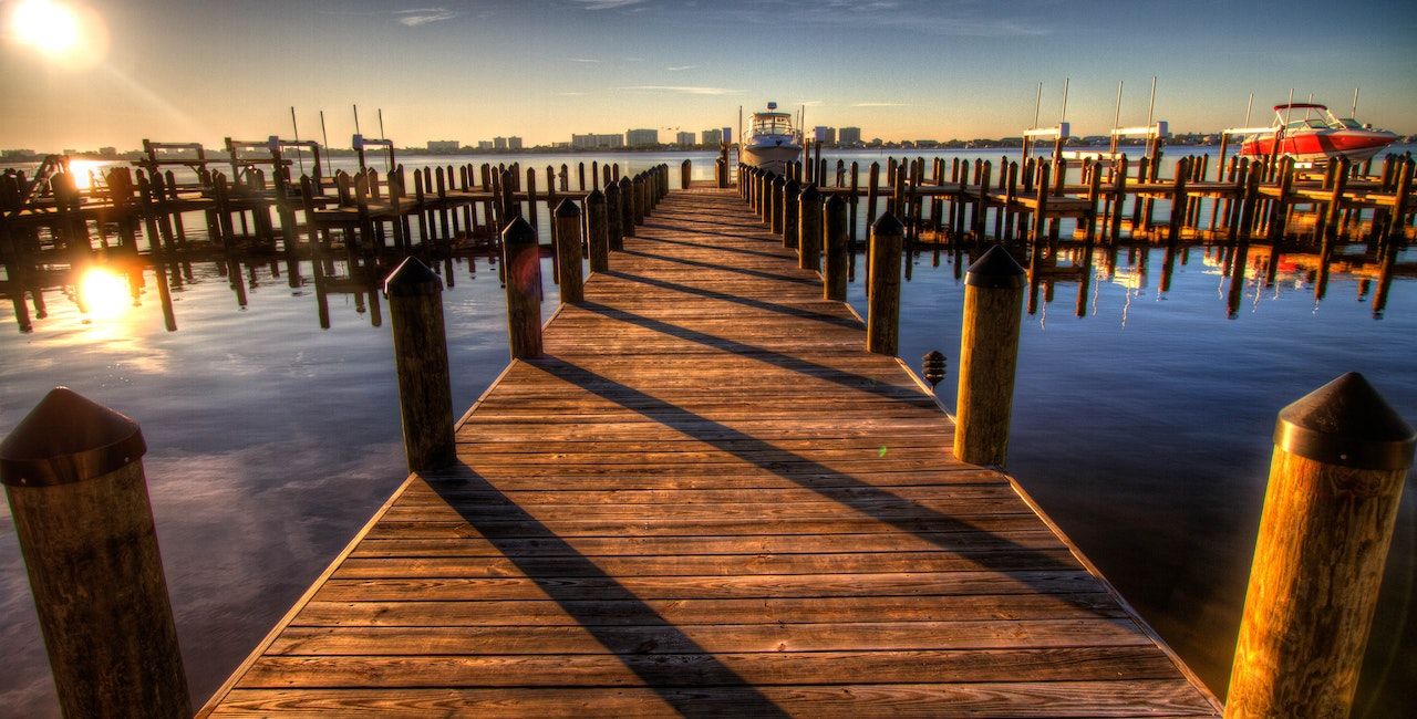 A photo of a dock that is almost empty.