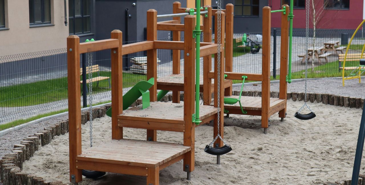Photo of a kids' sandbox/play area.