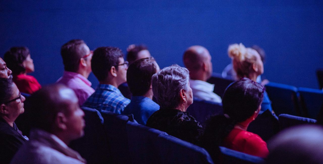 People sitting at a conference.