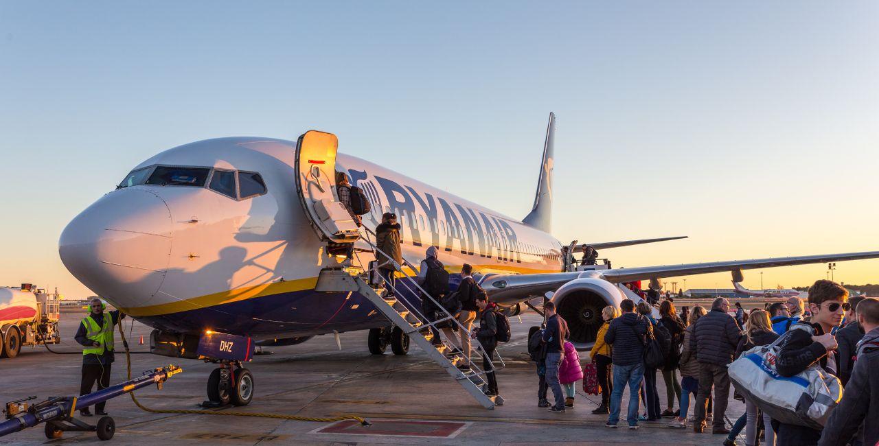 People boarding an airplane.